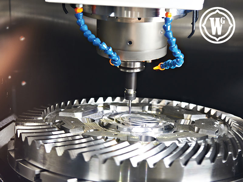 CNC mill machining a precision gear component