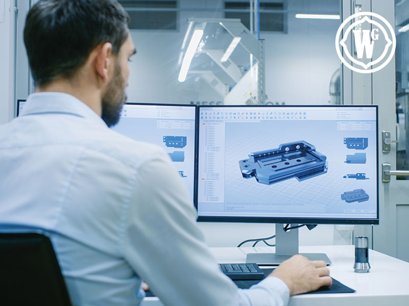 Engineer reviewing a CAD design on screen